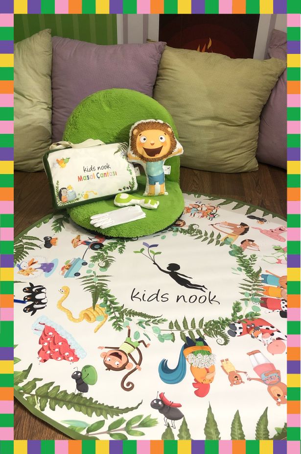 Kidsnook hikâye halısı, aslan kuklası ve sessiz kitap materyalleri